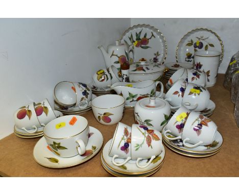 ROYAL WORCESTER EVESHAM DINNER AND TEA WARES, including two flan dishes, a coffee pot and cover, a twin handled serving dish 