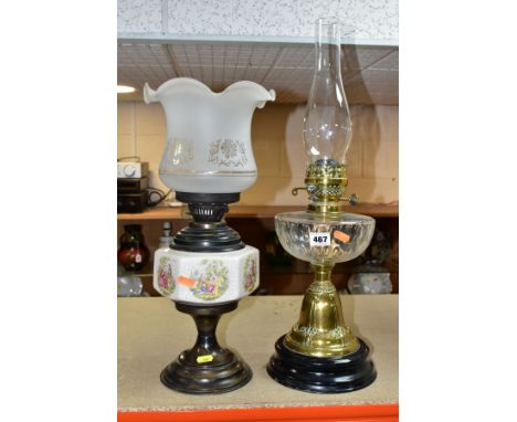 A BRASS ART NOUVEAU STYLE OIL LAMP, with glass funnel and cut glass well, height in total 59cm, together with another modern 