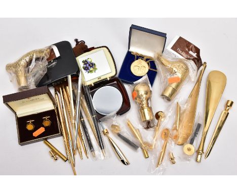 A BOX OF MISCELLANEOUS ITEMS, to include three indivually packaged brass walking stick handles, a cased pair of yellow metal 