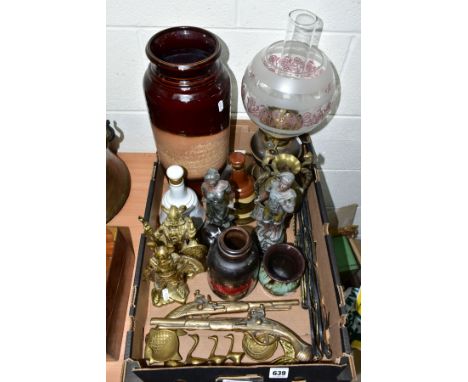 A BOX OF METALWARES AND CERAMICS, including two leather straps of replica horse brasses, a pair of spelter figures of a lady 