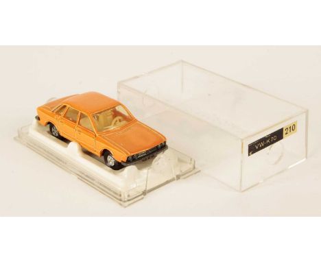 Majorette 210 Volkswagen K-70 - orange body, pale amber windows, ivory interior, bare metal base, early solid chrome hubs - N