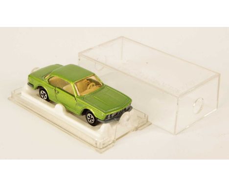 Majorette 235 BMW 3.0 CSi - metallic jade green body, light amber windos, ivory interior, bare metal base, 5-spoke star wheel