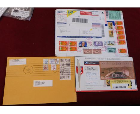 USA 1994-1999 Philatelic packages posted to London (3) used a variety of Postal Systems, all cancelled on an array of postage