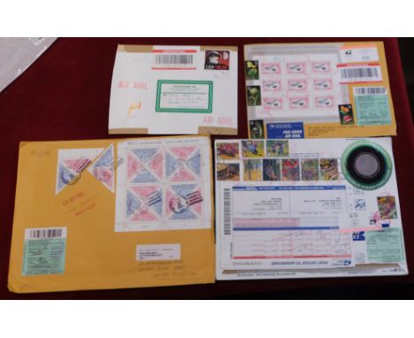 USA 2000-2001 group of 4 philatelic packages posted air mail to London, nice array of postage stamps and miniature sheets, me