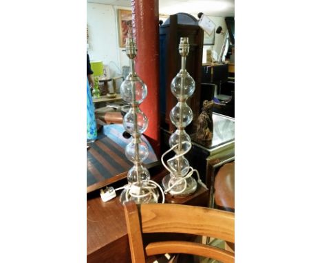 Pair of glass sphere lamp bases with chrome feet, overall 52 cm to top of lamp fitting. PAT tested Nov 2015, used at Calcot M
