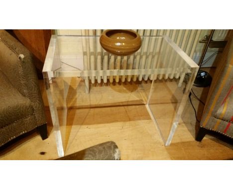 Heavy perspex side table. 60cm long, 35cm deep, 50cm high. Used in Calcot Manor. Some light marks and scratches.