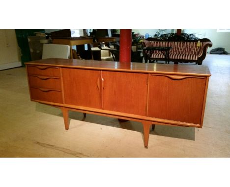 Retro 1970's teak sideboard in excellent condition, one pull down drinks cabinet, 3 drawers (inc baize lined cutlery drawer),