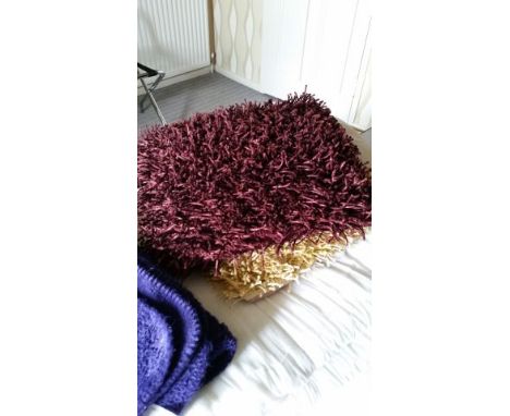 Pair of Aubergine tassle cushions c 42 cm square, and 1 Gold tassle cushion c 42 cm square, together with Aubergine fleece th
