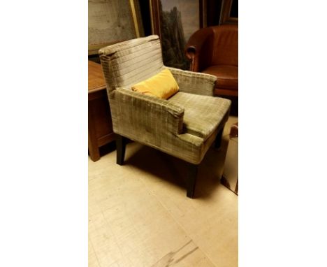 Beige/light brown covered lounge chair used at Calcot Manor