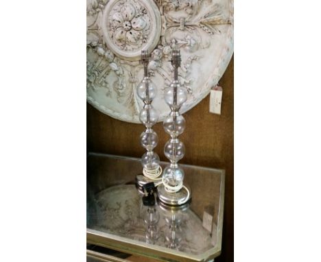 Pair of glass sphere lamp bases with chrome feet, overall 52 cm to top of lamp fitting. PAT tested Nov 2015, used at Calcot M