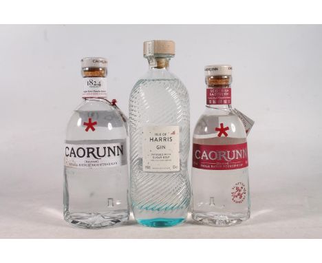 Three bottles of gin to include ISLE OF HARRIS 45% abv. 70cl, CAORUNN 41.8% abv. 70cl and CAORUNN Scottish Raspberry gin 41.8