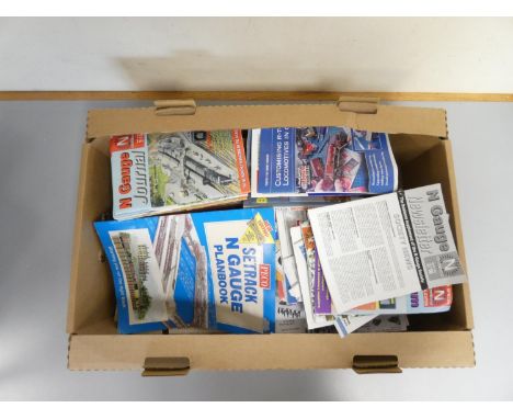Box of model railway magazines and publications to include the N Gauge Journal, along with N gauge track components to includ