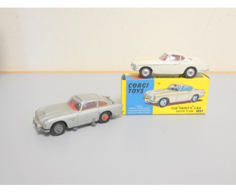 Corgi Toys. A boxed The “Saints” Car Volvo P.1800 with white body, red interior, the Saint figure&nbsp;(cracked windscreen) n