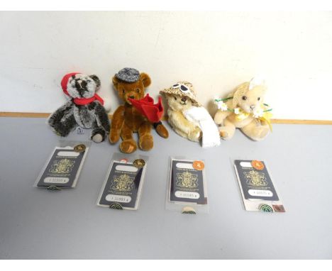 Merrythought. Four limited edition collectors teddy bears to include Frosty 17 / 950, Windy Days 61 / 950, Beach Belle 192 / 