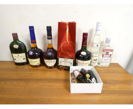 Group of mixed alcohol mostly spirits to include three bottles of Courvoisier cognac 40% ABV 70cl, another similar 35cl, Smir