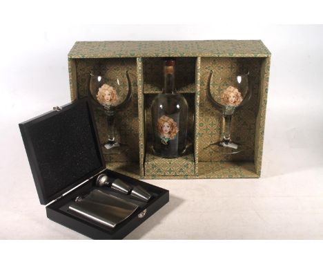 DAFFYS gin gift set with bottle of Daffy's gin 43.4% abv. 70cl and two glasses boxed, also a cased hip flask set. (2)