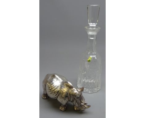 Waterford crystal Ashling pattern decanter, H34cm and filled silver model of a Rhinoceros by Camelot Silverware, 2007, L21cm 