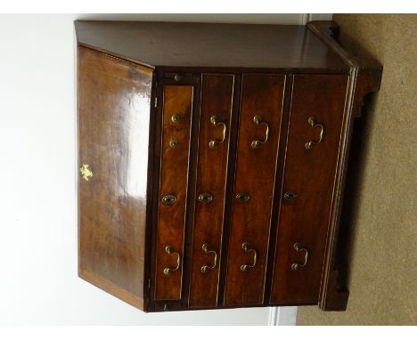 Late 19th century mahogany bureau, fall front enclosing fitted interior, one short and three graduating drawers, shaped brack