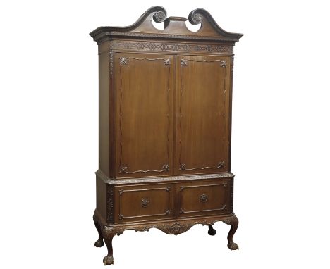 Early 20th century mahogany Chippendale style cabinet, carved swan neck pediment above blind fretwork frieze and acanthus car