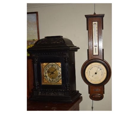 Early 20th Century German three-train chiming bracket clock, Keinzle, with silvered Arabic chapter ring in dark oak architect