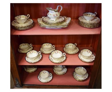 Early 20th Century Cauldon china tea service with floral, blue and gilt decoration  