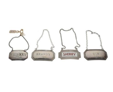Victorian silver decanter label for 'Whisky', London 1973, together with an engine turned and enamel decanter label marked 'S