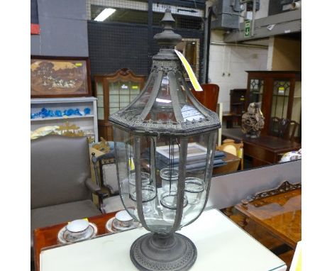 A tulip form verdigris finish garden lantern