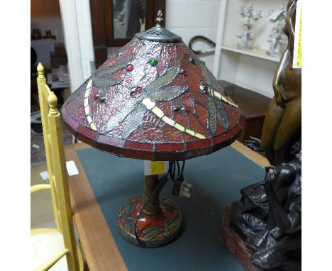 A Tiffany lamp with dragon fly decorated shade 