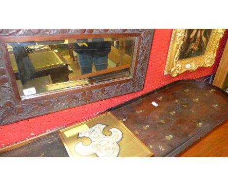An Oriental needlework arrangement and carved mirror and bagatelle board