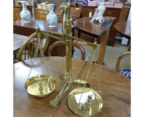 A set of brass weighing scales  
