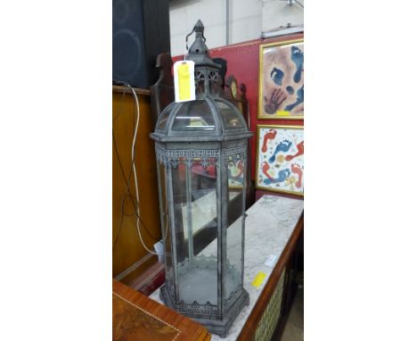 A pagoda form verdigris finish garden lantern