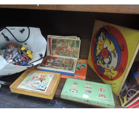 A shelf of mixed toys including Chad Valley Donald Duck hoop board, wooden picture block set, plastic figures etc