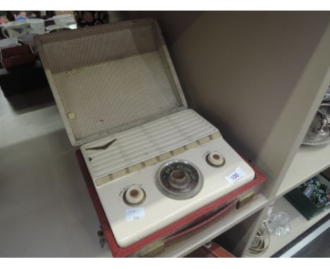 A vintage portable radio Fergusson Flair herringbone case with red trim and handle 