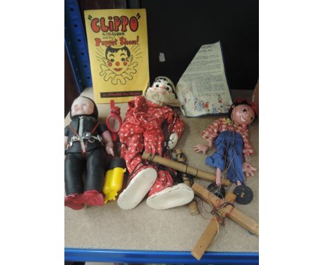 A EffanBee Clippo clown, a Pelham Country girl puppet and a Rondine Cressi (Italy) celluloid deep sea diver