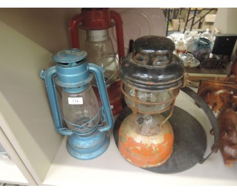 A selection of vintage storm lanterns paraphin burners Bullfinch, FroWo Germany and Black Spur Hand Tools 