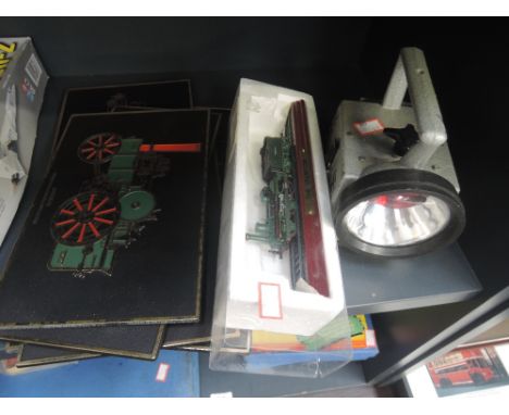A Bardic lamp, five plastic vintage engine pictures and a oo gauge model loco & tender