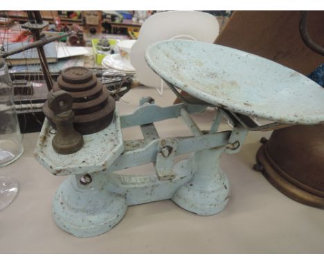 A vintage cast scale set with weights