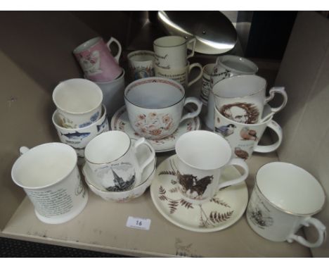 A large selection of ceramic mugs including Wedgwood coronation ware etc