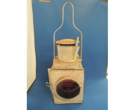 A BR (M) railway parifin lamp having red lense