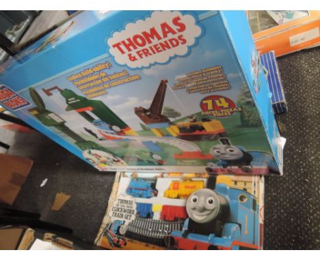A Hornby 00 gauge Thomas the Tank Engine part set and a Mega Bloks Thomas & friends set