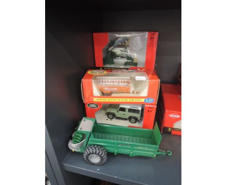 A Britains diecast, Howard Rotary Muck Spreader, boxed 9575 and four modern Britains Tomy diecasts, Spearhead Orbital Reach M