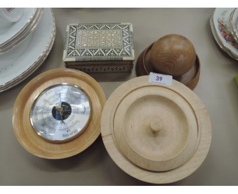 A selection of treen wood items including ornate bone and mother of pearl inlay trinket box