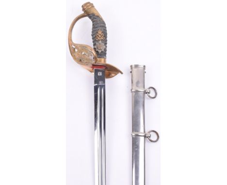 Imperial German Prussian Garde Infantry Model 1889 Officers Sword, early type with large fixed brass guard, having Prussian e