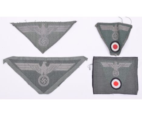 Grouping of WW2 German Army Cloth Insignia, consisting of one piece eagle and cockade bevo M43 cap insignia, un-issued M43 be