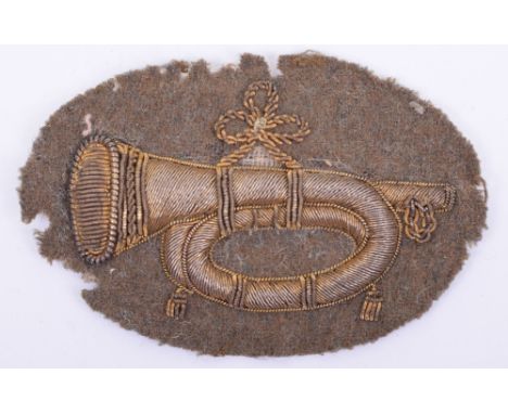 Great War Period Buglers Arm Badge, heavily embroidered bullion wire bugle on khaki oval cloth backing. Uniform removed examp