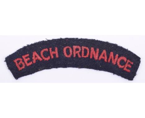WW2 Beach Ordnance Cloth Shoulder Title, red embroidered on black backing cloth. Title remains in good overall condition. The