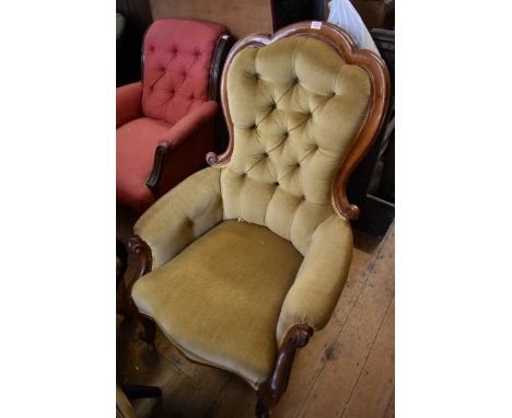 A Victorian walnut and button upholstered occasional armchair.&nbsp; 