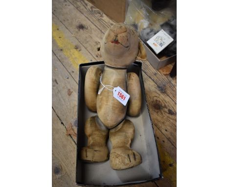 A Chad Valley 'Bonzo',&nbsp;approx 35cm long, (worn and distressed).&nbsp; 