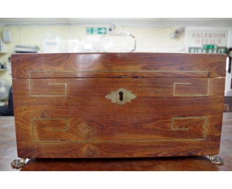 A Regency rosewood and brass strung tea caddy,&nbsp;with silver handle hallmarked Samuel Whitford II, London 1815, 30.5cm wid