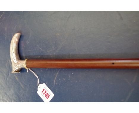 A Continental silver and hardwood walking stick. 